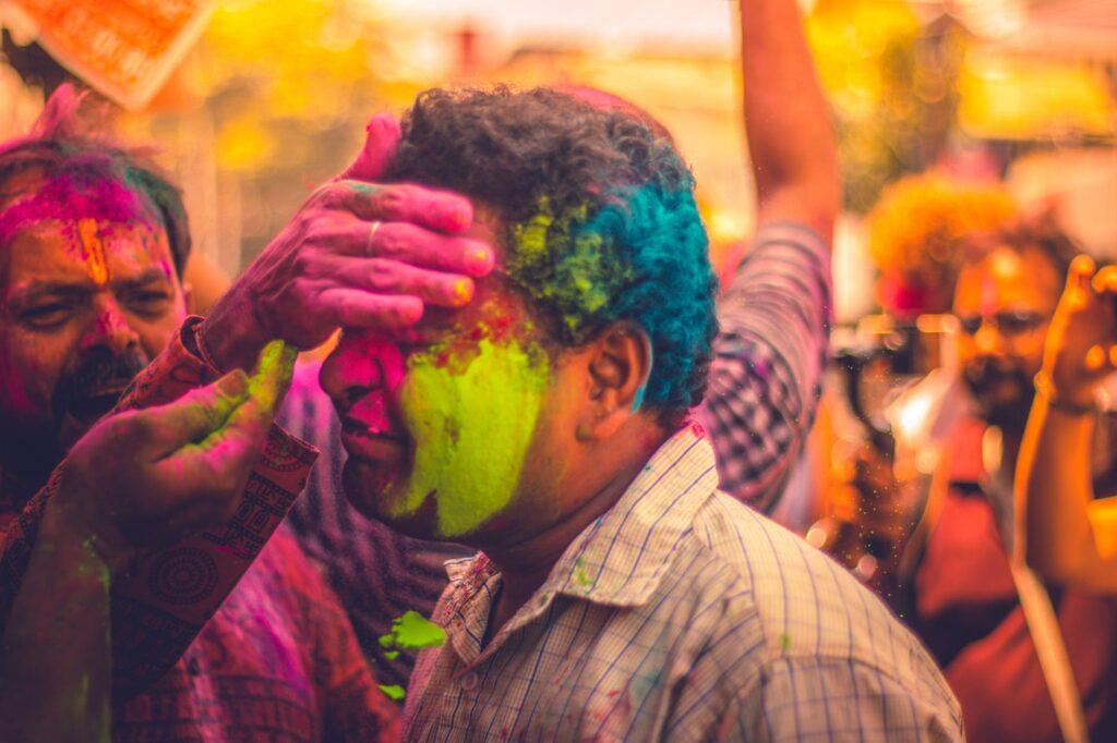 person painted the face of man