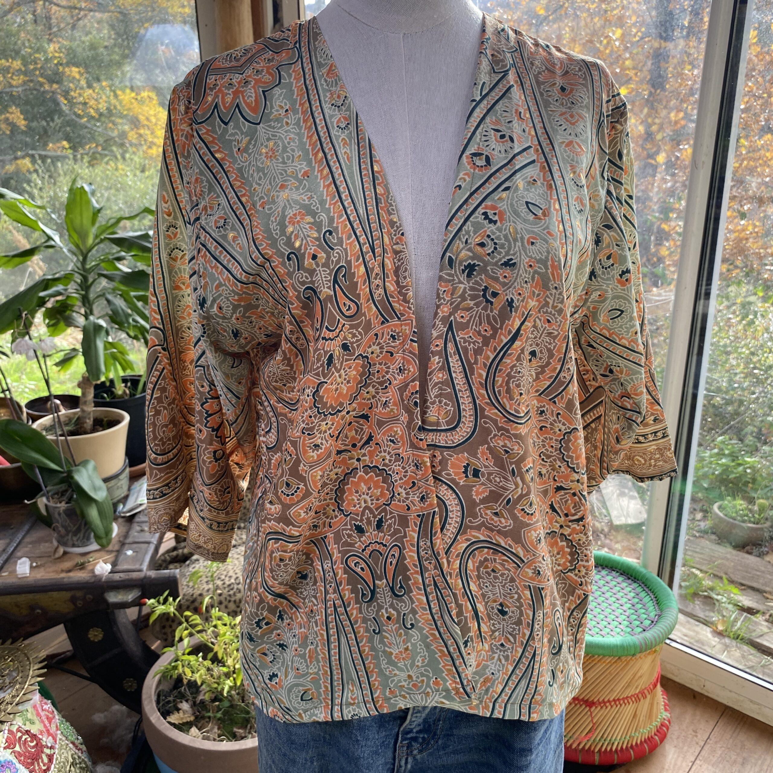 petit gilet polysilk vert et orange 1